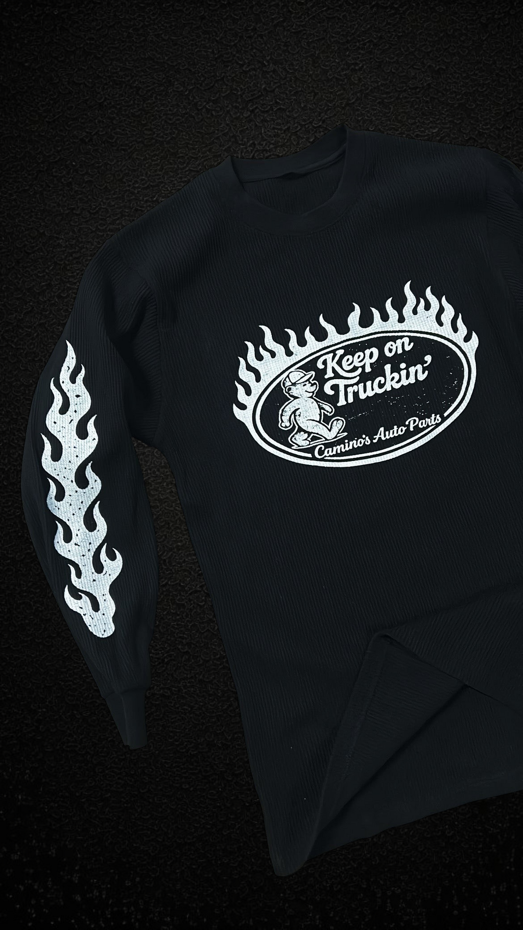 Camino’s Auto Parts black thermal long sleeve shirt with white bear graphic and flame sleeve prints