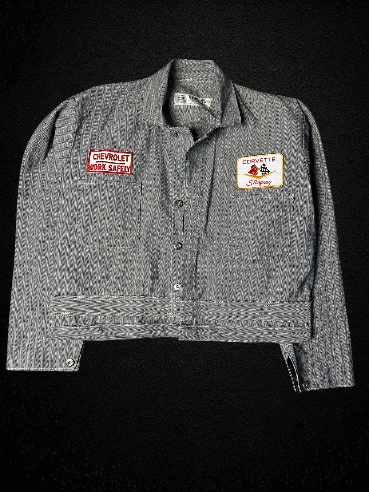 Camino’s Auto Parts reworked grey herringbone twill trucker jacket with vintage Chevrolet and Corvette Stingray patches