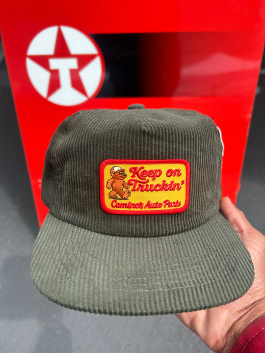Camino’s Auto Parts ‘Keep On Truckin’ Green Unstructured Fit Trucker Hat