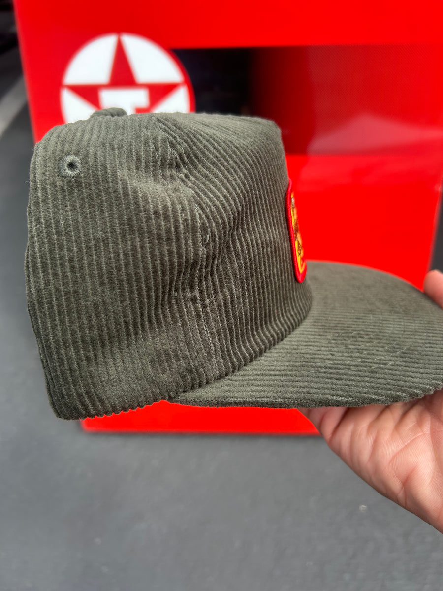 Camino’s Auto Parts ‘Keep On Truckin’ Green Unstructured Fit Trucker Hat