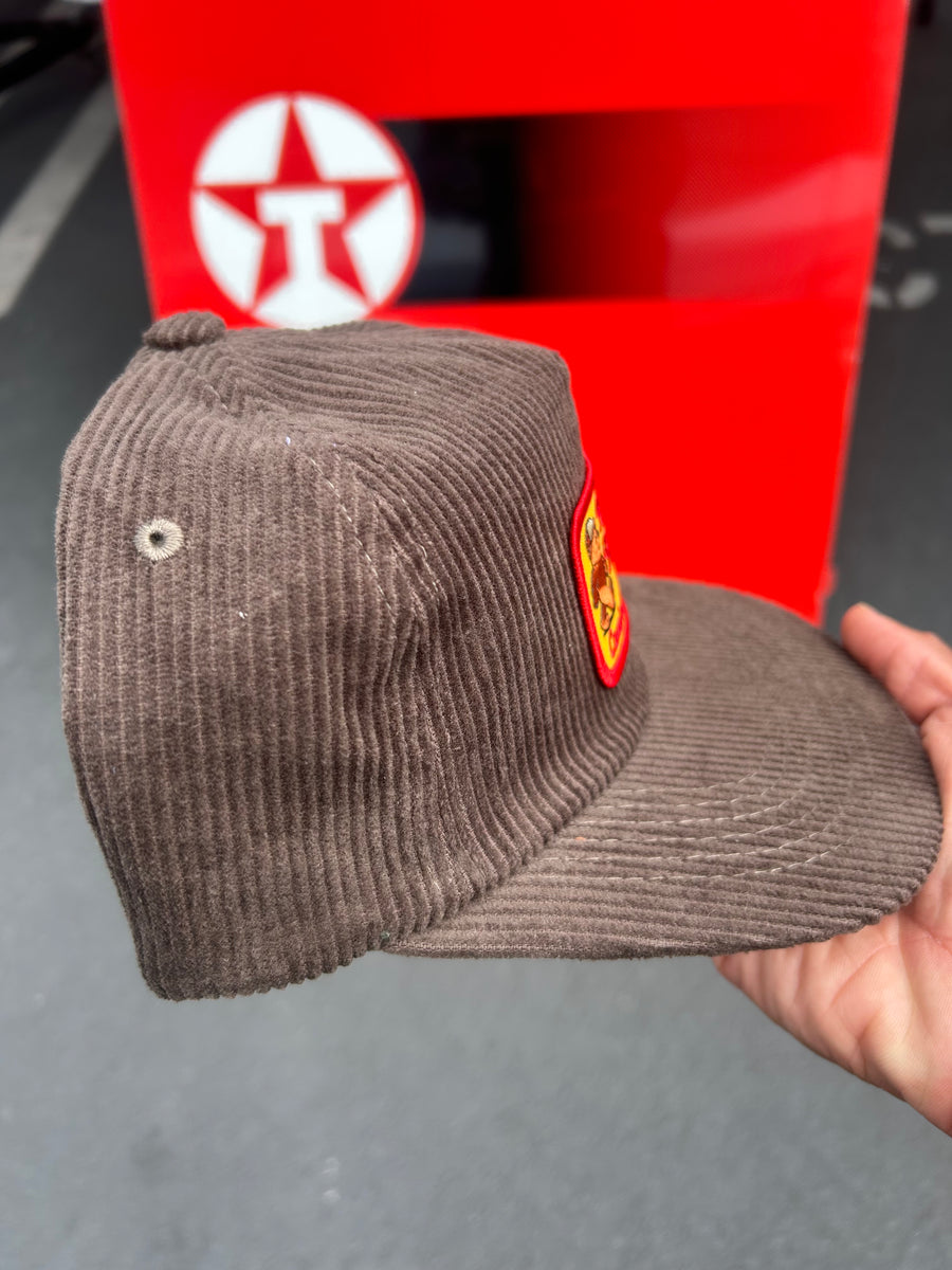 Camino’s Auto Parts ‘Keep On Truckin’ Brown Unstructured Fit Trucker Hat